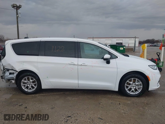 2023 Chrysler Pacifica Touring L with VIN 2C4RC1BG6PR520945, listed as a IAAI auction lot 41591128 with 70,351 mi miles and . Bid and sale history available at DreamBid. Image 14.