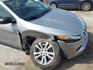 2015 Jeep Cherokee Sport with VIN 1C4PJLAB2FW696010, listed as a IAAI auction lot 42032956 with 88,323 mi miles. Bid and sale history available at carsss.com. Image 6.