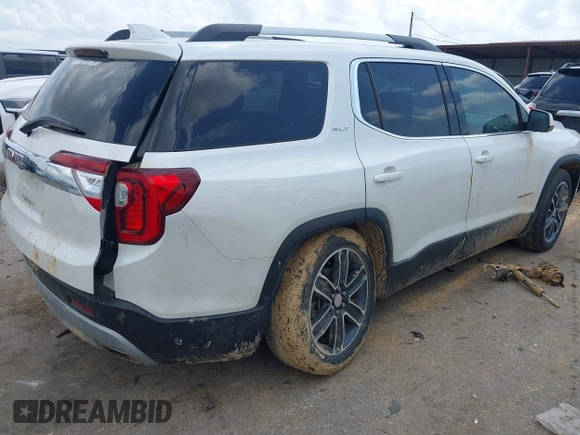 2021 GMC Acadia SLT with VIN 1GKKNMLS8MZ114591, listed as a IAAI auction lot 42052137 with 73,313 mi miles and . Bid and sale history available at DreamBid. Image 4.