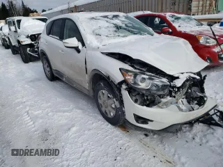 2016 Mazda CX-5 Touring z VIN JM3KE4CY1G0703496, wystawiony jako Copart lot #43806525 z przebiegiem Nie podano mil oraz Szkoda całkowita • Salvage title. Historia ofert i sprzedaży dostępna na DreamBid. Obrazek 4.