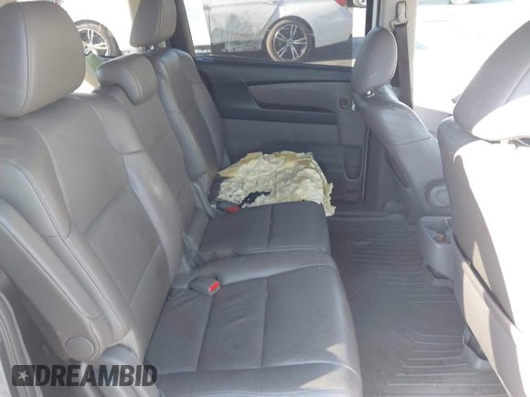 2014 Honda Odyssey EX-L with VIN 5FNRL5H65EB012528, listed as a IAAI auction lot 41951424 with 161,832 mi miles and . Bid and sale history available at DreamBid. Image 8.