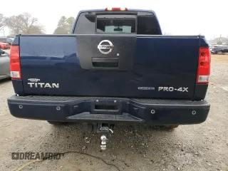 2011 Nissan Titan Pro-4X z VIN 1N6BA0EC0BN322228, wystawiony jako Copart lot #47617305 z przebiegiem 189 151 mil mil oraz Szkoda całkowita • Salvage title. Historia ofert i sprzedaży dostępna na DreamBid. Obrazek 6.