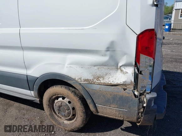 2015 Ford Transit Cargo with VIN 1FTNE1YM0FKA48857, listed as a IAAI auction lot 42018604 with 267,320 mi miles and . Bid and sale history available at DreamBid. Image 6.