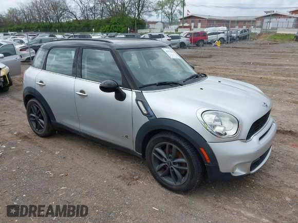2011 MINI Countryman S with VIN WMWZC5C51BWM10385, listed as a IAAI auction lot 41952679 with 112,008 mi miles and . Bid and sale history available at DreamBid. Image 1.