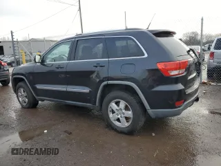 2011 Jeep Grand Cherokee Laredo with VIN 1J4RS4GG8BC508482, listed as a Copart auction lot 79261304 with 208,265 mi miles and Salvage Title. Bid and sale history available at DreamBid. Image 2.