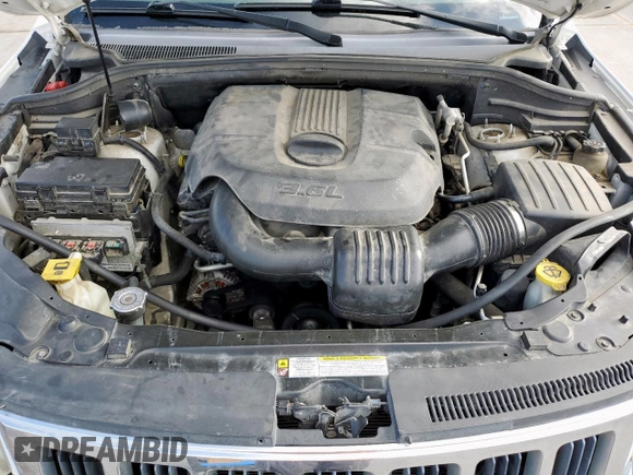 2011 Jeep Grand Cherokee Laredo z VIN 1J4RR4GG2BC617810, wystawiony jako Copart lot #62424125 z przebiegiem 205 945 mil mil oraz Szkoda całkowita • Salvage title. Historia ofert i sprzedaży dostępna na DreamBid. Obrazek 11.