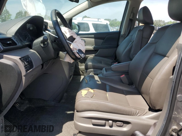 2014 Honda Odyssey Touring with VIN 5FNRL5H93EB061754, listed as a Copart auction lot 55182015 with 168,058 mi miles and Salvage title. Bid and sale history available at DreamBid. Image 7.