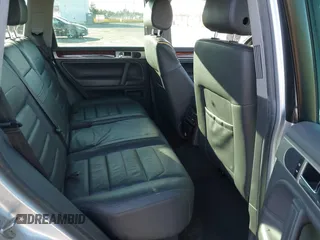 2010 Volkswagen Touareg VR6 with VIN WVGBF7A92AD001704, listed as a IAAI auction lot 41751316 with 80,597 mi miles and . Bid and sale history available at DreamBid. Image 8.