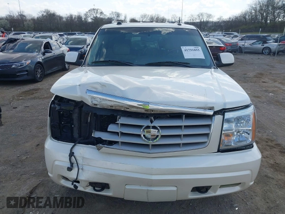 2005 Cadillac Escalade z VIN 1GYEC63T55R115387, wystawiony jako IAAI lot #41791855 z przebiegiem 165 246 mil mil oraz . Historia ofert i sprzedaży dostępna na DreamBid. Obrazek 13.