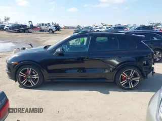 2014 Porsche Cayenne GTS z VIN WP1AD2A24ELA76457, wystawiony jako IAAI lot #41538390 z przebiegiem 101 082 mil mil oraz . Historia ofert i sprzedaży dostępna na DreamBid. Obrazek 15.