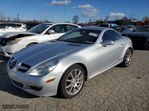 2005 Mercedes-Benz SLK-Class with VIN WDBWK56F45F071623, listed as a Copart auction lot 84751524 with 84,579 mi miles and Salvage Title. Bid and sale history available at carsss.com. Image 1.