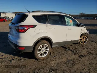 2018 Ford Escape SE z VIN 1FMCU9GD3JUB16376, wystawiony jako Copart lot #83453484 z przebiegiem 163 251 mil mil oraz Szkody całkowita. Historia ofert i sprzedaży dostępna na DreamBid. Obrazek 3.