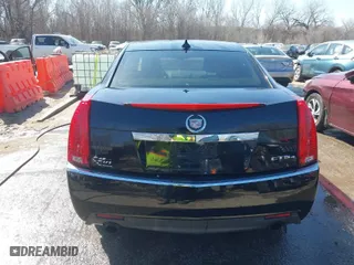 2009 Cadillac CTS AWD w/1SA with VIN 1G6DH577290166448, listed as a IAAI auction lot 41751610 with 158,378 mi miles. Bid and sale history available at carsss.com. Image 16.