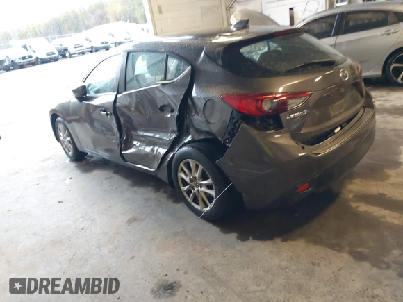 2015 Mazda 3 i Grand Touring z VIN JM1BM1M70F1222597, wystawiony jako IAAI lot #41960987 z przebiegiem 40 841 mil mil oraz . Historia ofert i sprzedaży dostępna na DreamBid. Obrazek 3.