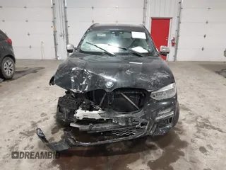 2019 BMW X3 M40i with VIN 5UXTS3C52KLR73137, listed as a IAAI auction lot 41632965 with 76,713 mi miles and . Bid and sale history available at DreamBid. Image 12.