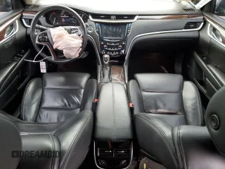2017 Cadillac XTS Luxury z VIN 2G61M5S38H9165134, wystawiony jako Copart lot #87735945 z przebiegiem 118 643 mil mil oraz Nie do naprawy. Historia ofert i sprzedaży dostępna na DreamBid. Obrazek 8.