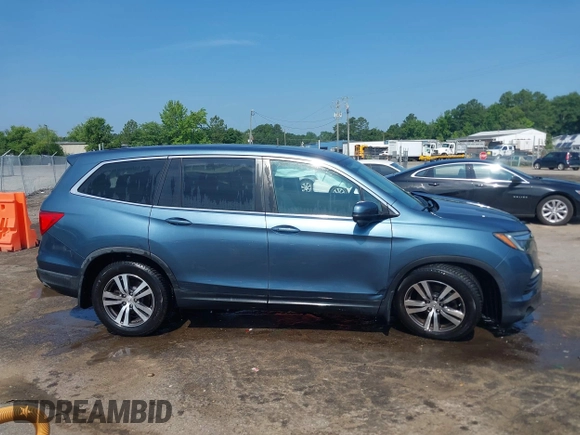 2018 Honda Pilot EX-L with VIN 5FNYF6H52JB050535, listed as a IAAI auction lot 42576721 with 99,280 mi miles and . Bid and sale history available at DreamBid. Image 13.