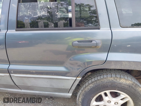 2002 Jeep Grand Cherokee Laredo with VIN 1J4GW48S92C150162, listed as a IAAI auction lot 42471732 with 171,677 mi miles and . Bid and sale history available at DreamBid. Image 14.