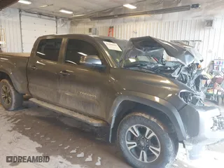 2016 Toyota Tacoma SR5 with VIN 5TFDZ5BN8GX012377, listed as a IAAI auction lot 41688620 with 138,531 mi miles. Bid and sale history available at carsss.com. Image 1.