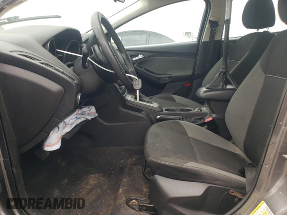 2013 Ford Focus SE with VIN 1FADP3F21DL320932, listed as a Copart auction lot 55031435 with 133,444 mi miles and Salvage title. Bid and sale history available at DreamBid. Image 7.