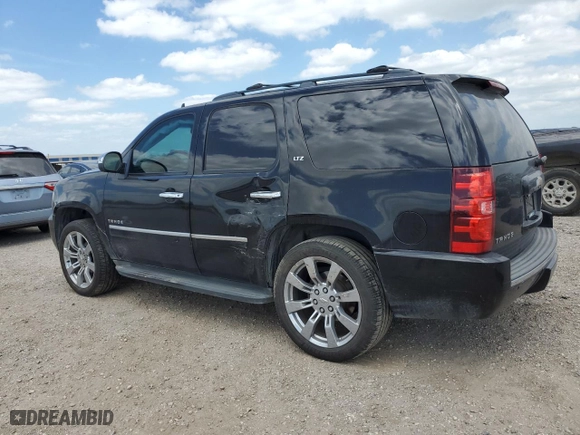 2011 Chevrolet Tahoe LTZ with VIN 1GNSCCE07BR131782, listed as a Copart auction lot 52981165 with 263,958 mi miles and Salvage Title. Bid and sale history available at carsss.com. Image 2.