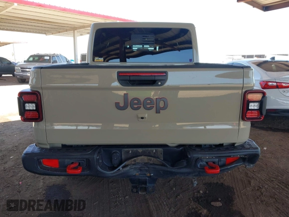 2022 Jeep Gladiator Rubicon with VIN 1C6JJTBG2NL164117, listed as a IAAI auction lot 42450350 with 22,326 mi miles and . Bid and sale history available at DreamBid. Image 16.