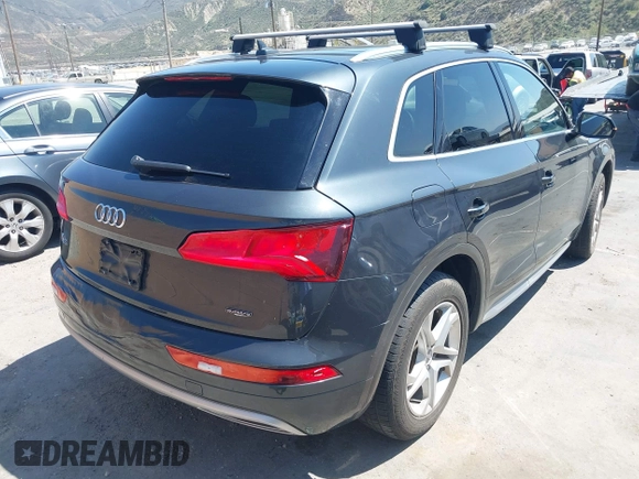 2019 Audi Q5 Premium with VIN WA1ANAFYXK2093555, listed as a IAAI auction lot 41527826 with 55,955 mi miles and . Bid and sale history available at DreamBid. Image 4.