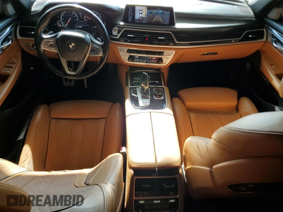 2016 BMW 7 Series 750i с VIN WBA7F0C56GGM20803, выставлен на аукционе Copart как лот 51183415 с пробегом 70 728 миль миль и Чистый • Clean title. История ставок и продаж доступна на DreamBid. Изображение 8.