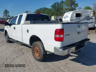 2005 Ford F-150 STX with VIN 1FTRX12W75NB89587, listed as a IAAI auction lot 41834540 with 326,100 mi miles. Bid and sale history available at carsss.com. Image 3.