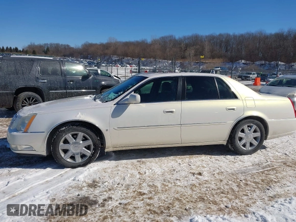 2006 Cadillac DTS 1SC z VIN 1G6KD57Y86U102513, wystawiony jako IAAI lot #41607409 z przebiegiem 102 438 mil mil oraz . Historia ofert i sprzedaży dostępna na DreamBid. Obrazek 14.