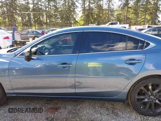 2016 Mazda Mazda6 i Grand Touring with VIN JM1GJ1W51G1436977, listed as a IAAI auction lot 42097363 with 128,941 mi miles. Bid and sale history available at carsss.com. Image 14.