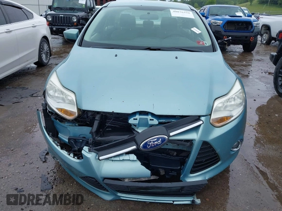 2012 Ford Focus SE with VIN 1FAHP3F21CL226033, listed as a IAAI auction lot 42368786 with 168,061 mi miles and . Bid and sale history available at DreamBid. Image 6.
