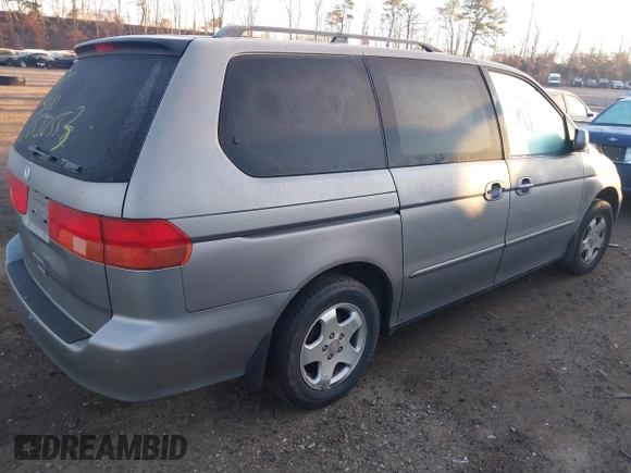 2000 Honda Odyssey EX with VIN 2HKRL1869YH599119, listed as a IAAI auction lot 41774615 with Not Provided miles and . Bid and sale history available at DreamBid. Image 4.