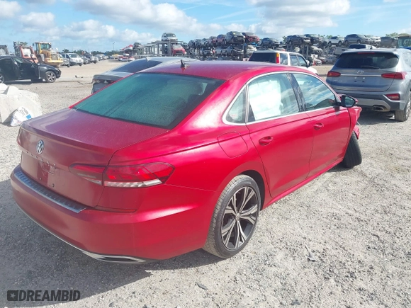 2021 Volkswagen Passat 2.0T SE with VIN 1VWSA7A30MC007748, listed as a IAAI auction lot 41843136 with 34,467 mi miles. Bid and sale history available at carsss.com. Image 4.