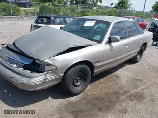 1995 Ford Crown Victoria with VIN 2FALP73W5SX140346, listed as a IAAI auction lot 41974429 with 166,540 mi miles. Bid and sale history available at carsss.com. Image 17.