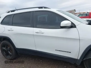 2016 Jeep Cherokee Latitude with VIN 1C4PJMCSXGW214243, listed as a IAAI auction lot 40850362 with 96,240 mi miles and . Bid and sale history available at carsss.com. Image 13.