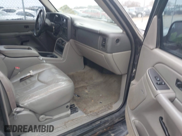 2004 GMC Yukon SLT with VIN 1GKEK13Z24J113954, listed as a IAAI auction lot 41950157 with 174,021 mi miles. Bid and sale history available at carsss.com. Image 5.