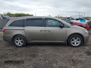 2012 Honda Odyssey EX-L with VIN 5FNRL5H68CB031930, listed as a IAAI auction lot 42222501 with 65,262 mi miles and . Bid and sale history available at DreamBid. Image 13.