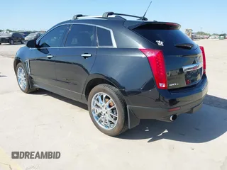 2013 Cadillac SRX Performance Collection with VIN 3GYFNHE35DS548632, listed as a IAAI auction lot 41990670 with 98,659 mi miles. Bid and sale history available at carsss.com. Image 3.
