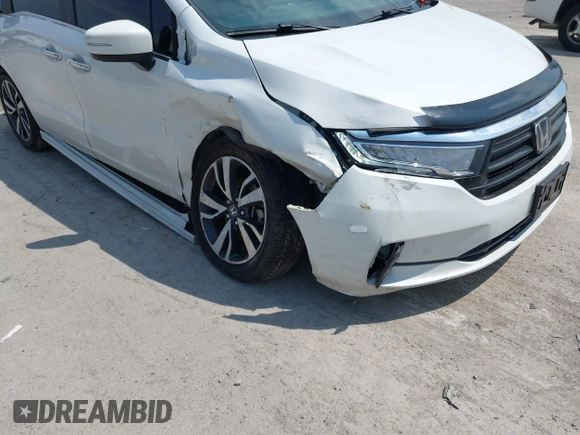 2021 Honda Odyssey Touring with VIN 5FNRL6H80MB010952, listed as a IAAI auction lot 42080412 with 90,594 mi miles and . Bid and sale history available at DreamBid. Image 6.