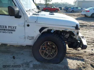 2019 Jeep Wrangler Unlimited Sport with VIN 1C4HJXDG5KW509033, listed as a IAAI auction lot 41468406 with 69,061 mi miles. Bid and sale history available at carsss.com. Image 6.