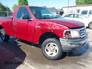 1999 Ford F-150 with VIN 1FTZF1723XNA23062, listed as a IAAI auction lot 42019826 with 232,648 mi miles and . Bid and sale history available at DreamBid. Image 6.