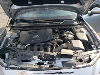 2019 Mazda 3 z VIN 3MZBPABL1KM113924, wystawiony jako Copart lot #54479075 z przebiegiem 116 948 mil mil oraz Szkoda całkowita • Salvage title. Historia ofert i sprzedaży dostępna na DreamBid. Obrazek 11.
