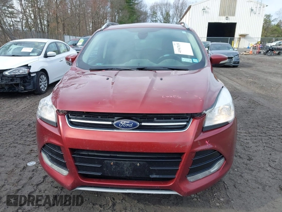 2015 Ford Escape Titanium with VIN 1FMCU9JX1FUA56091, listed as a IAAI auction lot 41947035 with 191,297 mi miles and . Bid and sale history available at DreamBid. Image 12.