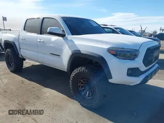 2019 Toyota Tacoma SR z VIN 3TMCZ5AN3KM277204, wystawiony jako IAAI lot #41752408 z przebiegiem 78 930 mil mil oraz . Historia ofert i sprzedaży dostępna na DreamBid. Obrazek 1.