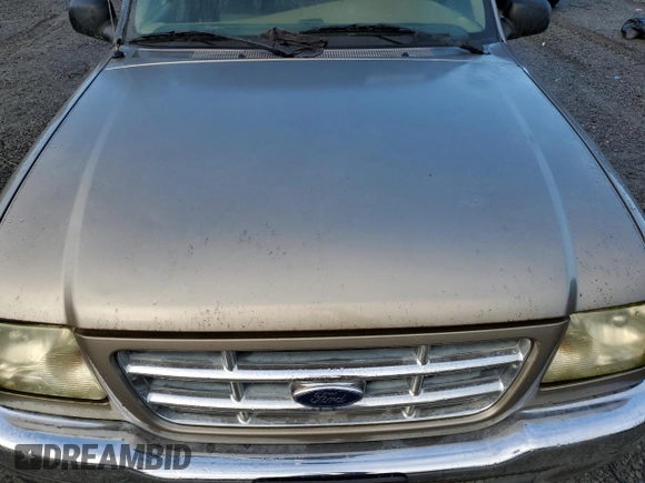 2003 Ford Ranger XL z VIN 1FTYR10D03PA33559, wystawiony jako Copart lot #76487344 z przebiegiem Nie podano mil oraz Czysty tytuł • Clean title. Historia ofert i sprzedaży dostępna na DreamBid. Obrazek 11.