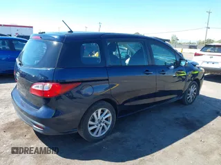2014 Mazda 5 Sport with VIN JM1CW2BLXE0175975, listed as a IAAI auction lot 40278614 with 102,430 mi miles and . Bid and sale history available at DreamBid. Image 4.