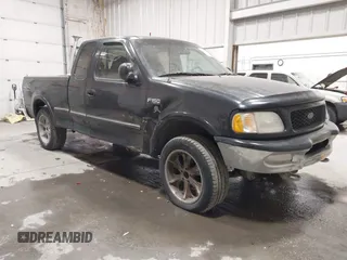 1997 Ford F-150 XL with VIN 1FTDX18W6VNB19712, listed as a IAAI auction lot 41740832 with 232,275 mi miles. Bid and sale history available at carsss.com. Image 1.