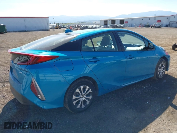 2022 Toyota Prius LE z VIN JTDKAMFP7N3198440, wystawiony jako IAAI lot #42147734 z przebiegiem 51 793 mil mil oraz . Historia ofert i sprzedaży dostępna na DreamBid. Obrazek 4.