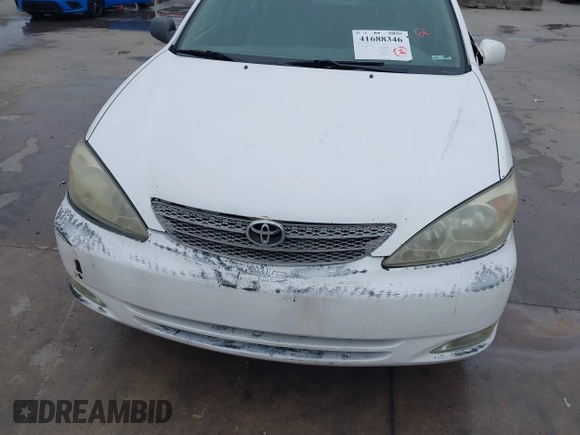 2003 Toyota Camry LE z VIN JTDBF30K530148403, wystawiony jako IAAI lot #41688346 z przebiegiem 299 143 mil mil oraz . Historia ofert i sprzedaży dostępna na DreamBid. Obrazek 18.